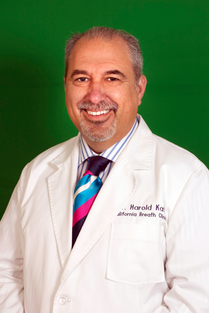 Dr Harold Katz of Therabreath standing in front of a green background Dr Harold Katz of Therabreath standing in front of a green background